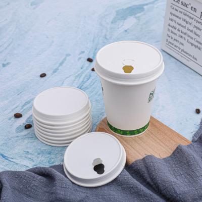 Reusable white paper coffee cup lids