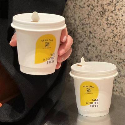 Aqueous coated paper cup lid